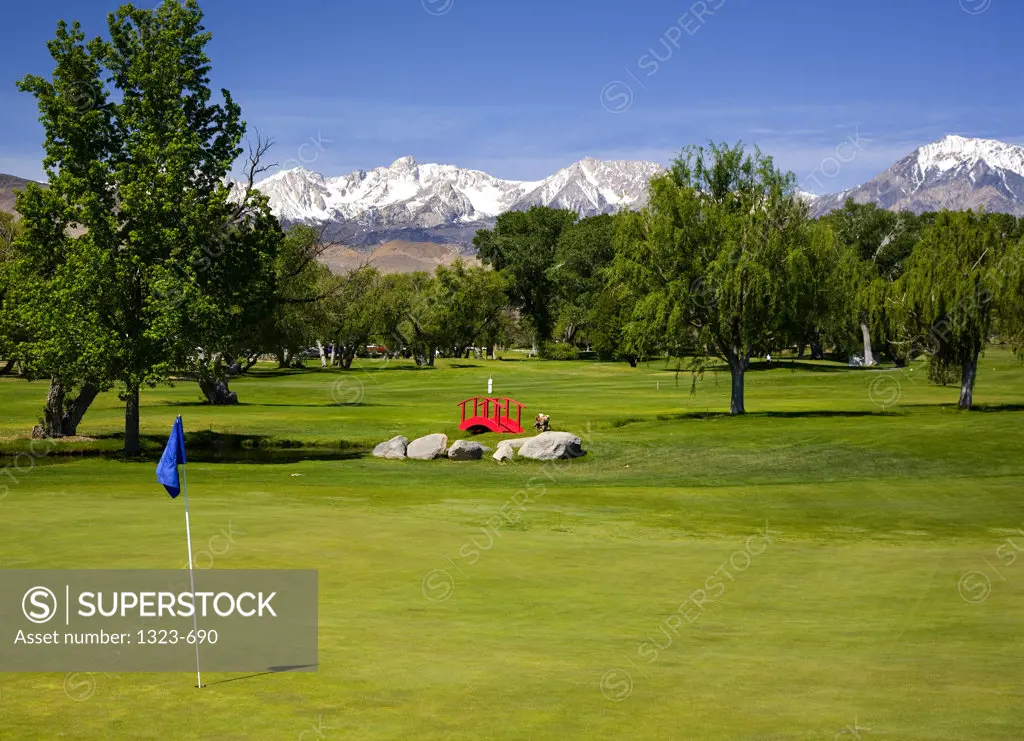 Golf course with mountains in the background, Californian Sierra Nevada, Owens Valley, Bishop, California, USA