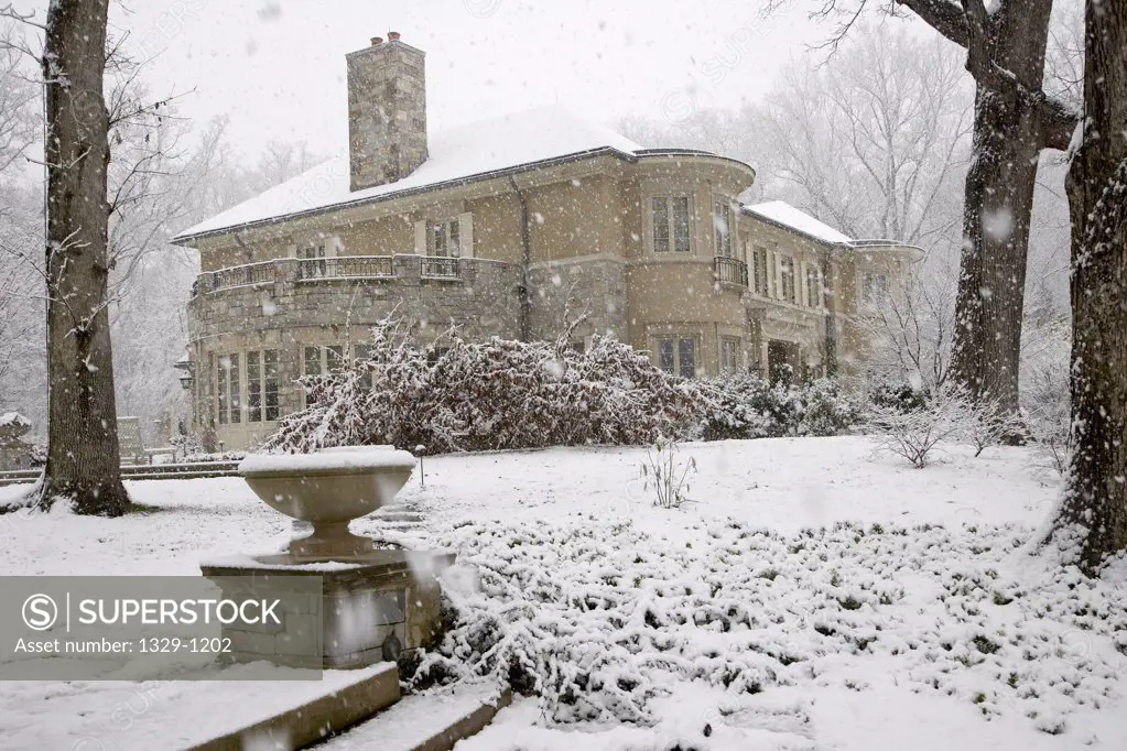 Mansion in winter snowstorm