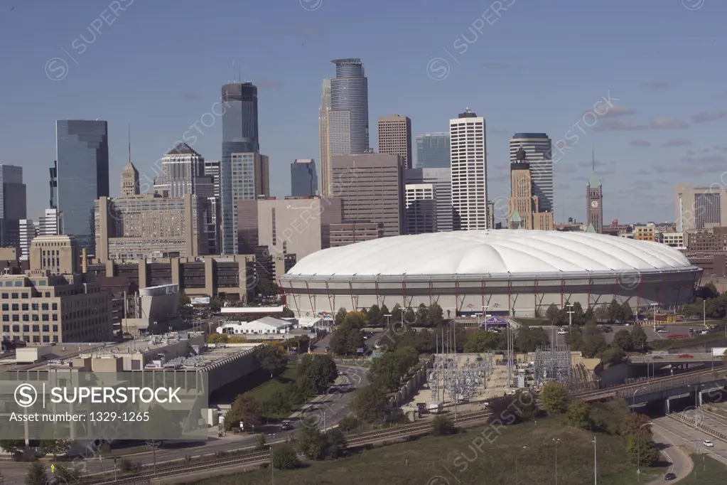 High angle view of a stadium with city skyline, Hubert H. Humphrey Metrodome, Minneapolis, Minnesota, USA
