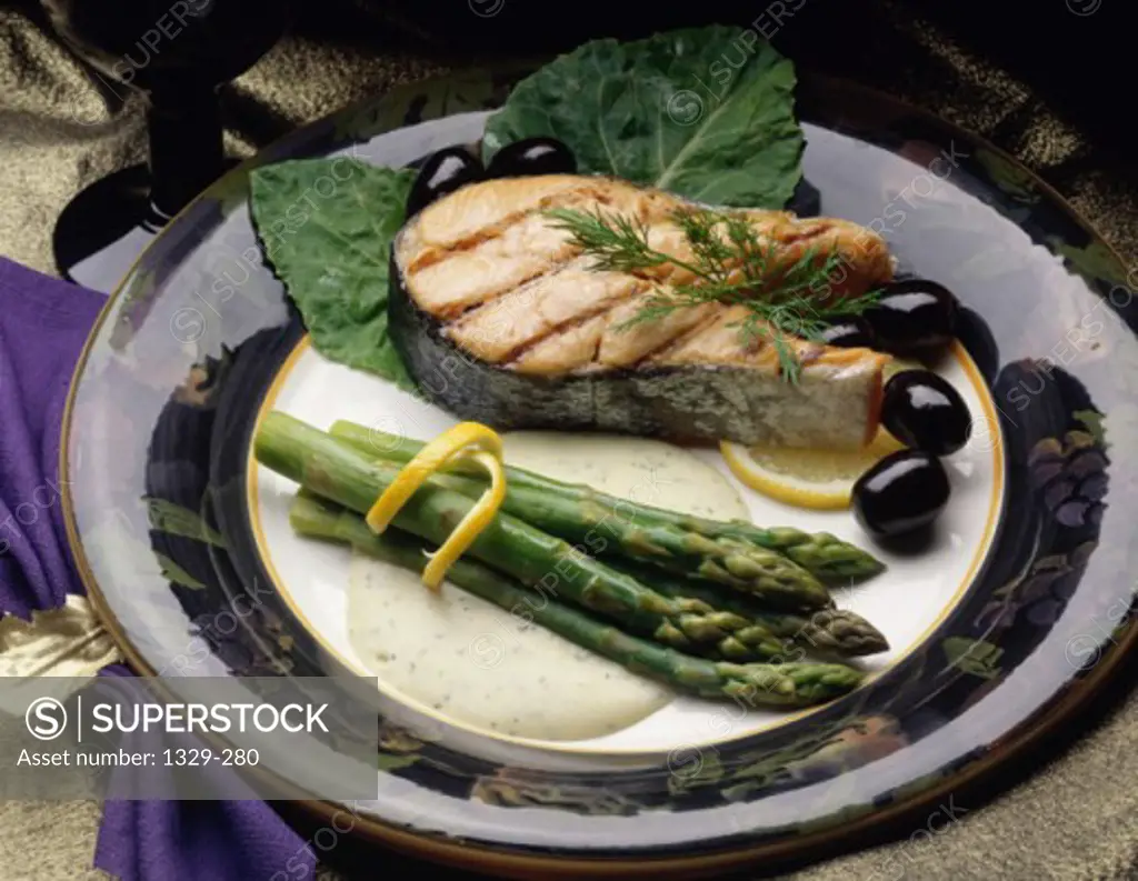 Close-up of asparagus and salmon on a plate