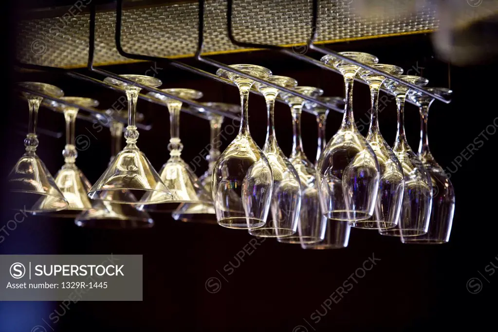 Bar and wine glasses hanging at bar