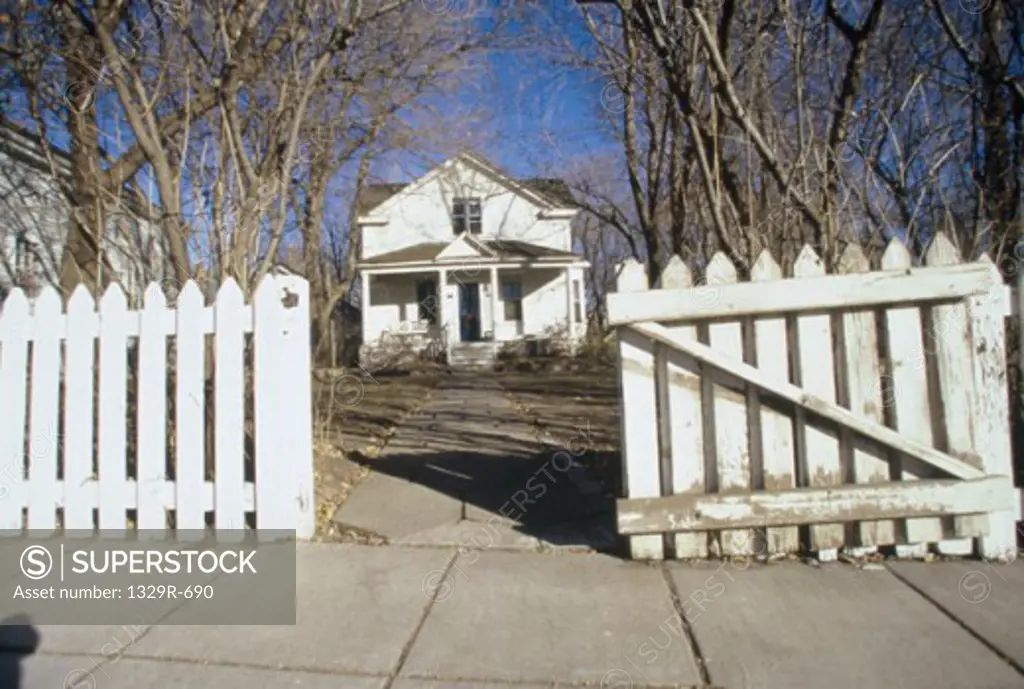 White picket fence of a house, Minneapolis, Minnesota, USA