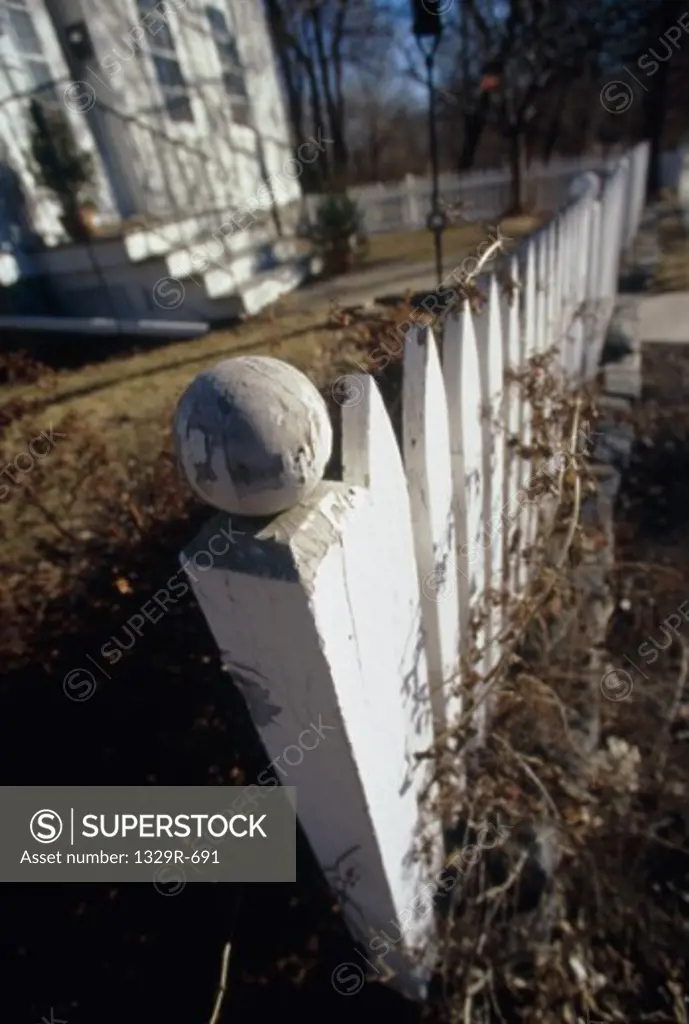 House with a white picket fence