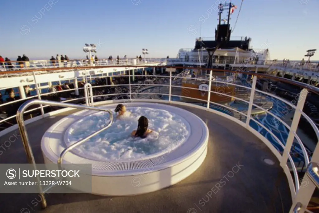 High angle view of two people in a hot tub on a cruise ship