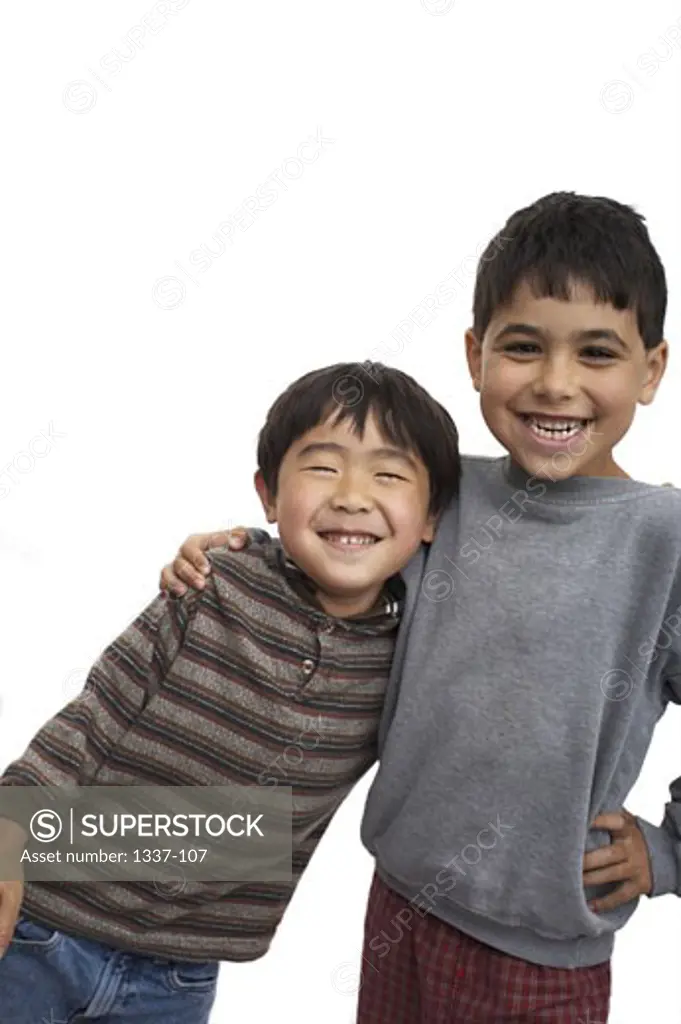 Close-up of two boys smiling