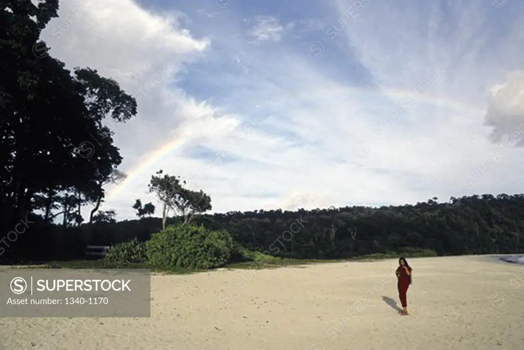 Woman walking on the beach, Radhanagar Beach, Havelock Island, Andaman Islands, Andaman and Nicobar Islands, India