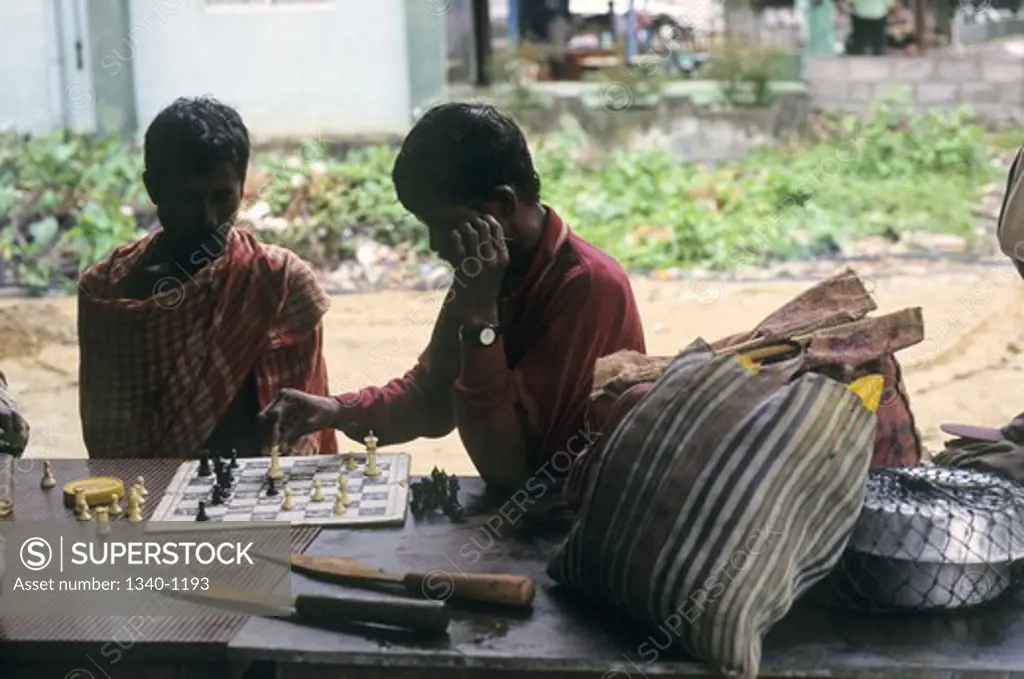 Two men playing chess, Wandoor Beach, Andaman Islands, Andaman and Nicobar Islands, India