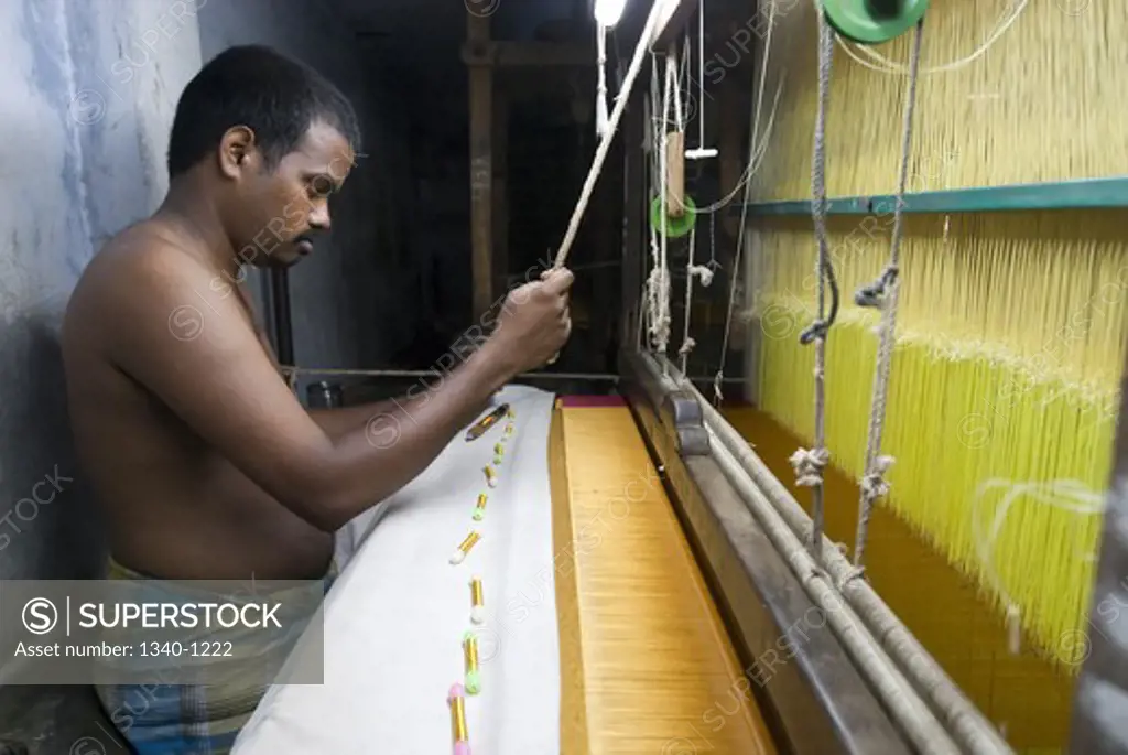 Woman weaving silk, Kanchipuram, Tamil Nadu, India