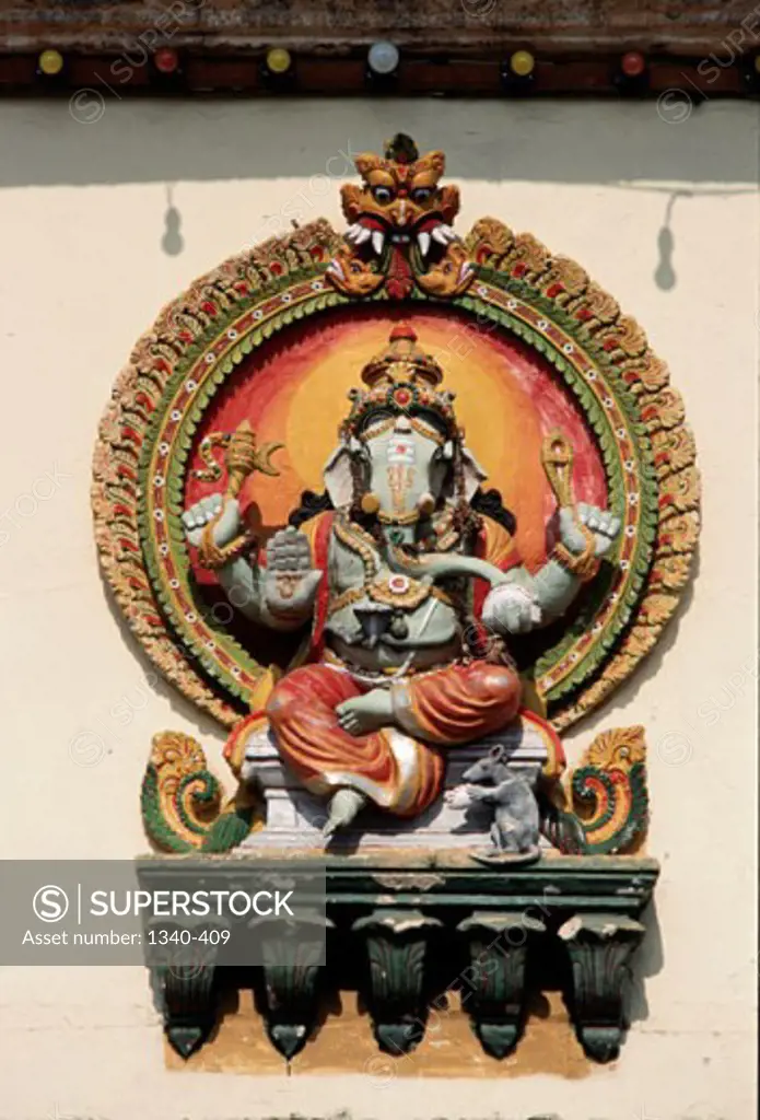 Close-up of the statue of Ganesha on the wall of a temple, Chamundeswari Temple, Mysore, Karnataka, India