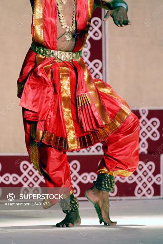 Low section view of a man performing Bharatnatyam, a classical dance of India, India