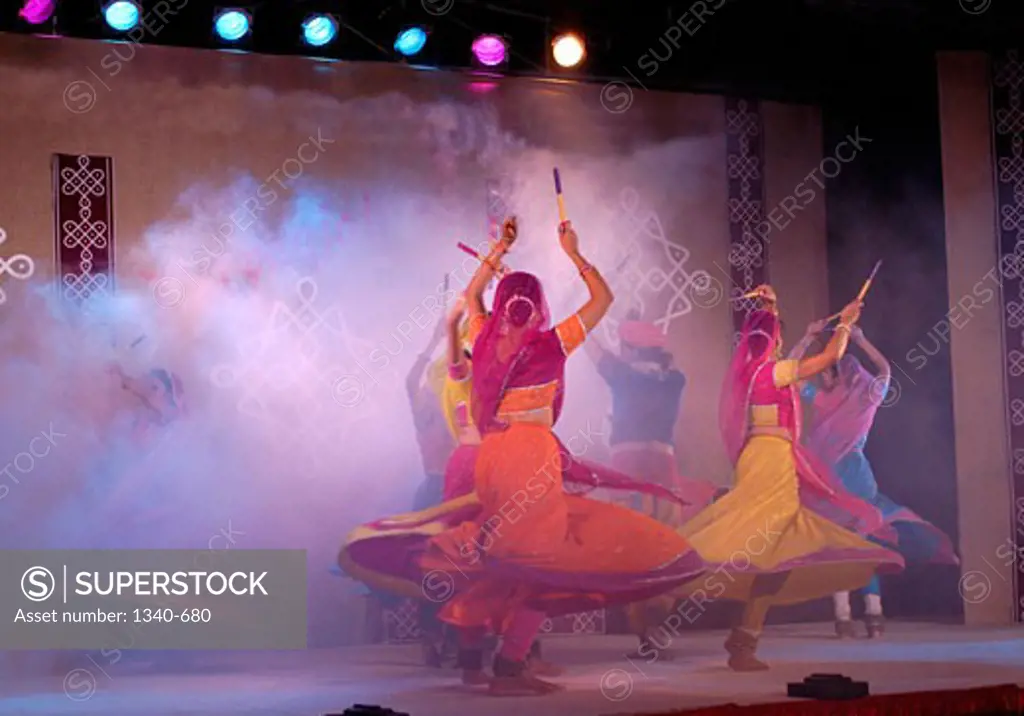 Group of people performing Kathak, a classical dance of India, India