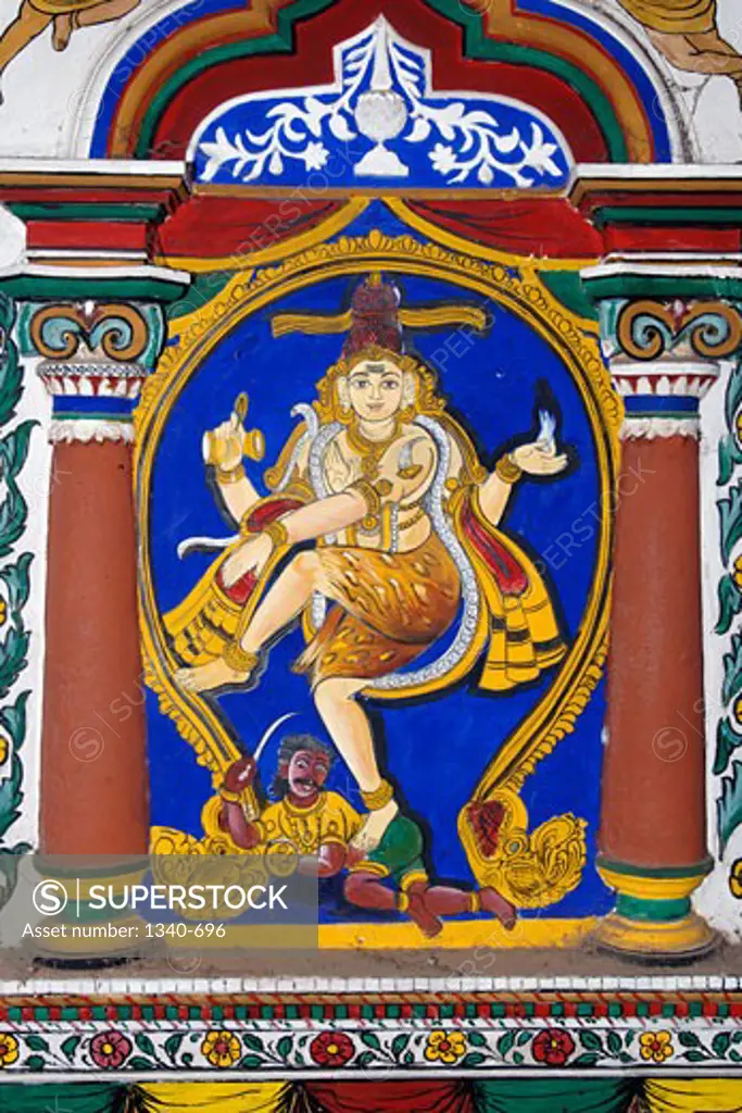 Lord Nataraja (Lord of Dance). 150 year old Mural (vegetable dye) and stucco work on the interior wall of the temple choultry at Pillaiyarpatti, Tamil Nadu, India. Artist Unknown