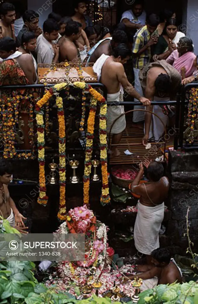 Group of people worshipping in a temple, Panachikkad Saraswati Temple, Kottayam, Kottayam District, Kerala, India