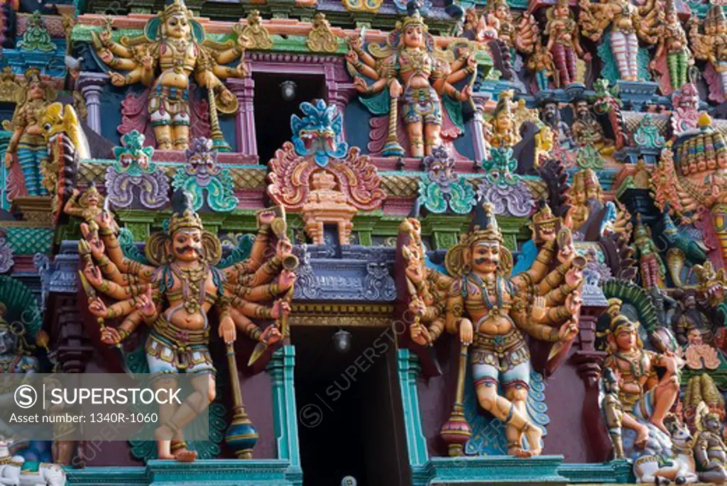Stucco figures of deities on a temple, Meenakshi Amman Temple, Madurai, Tamil Nadu, India
