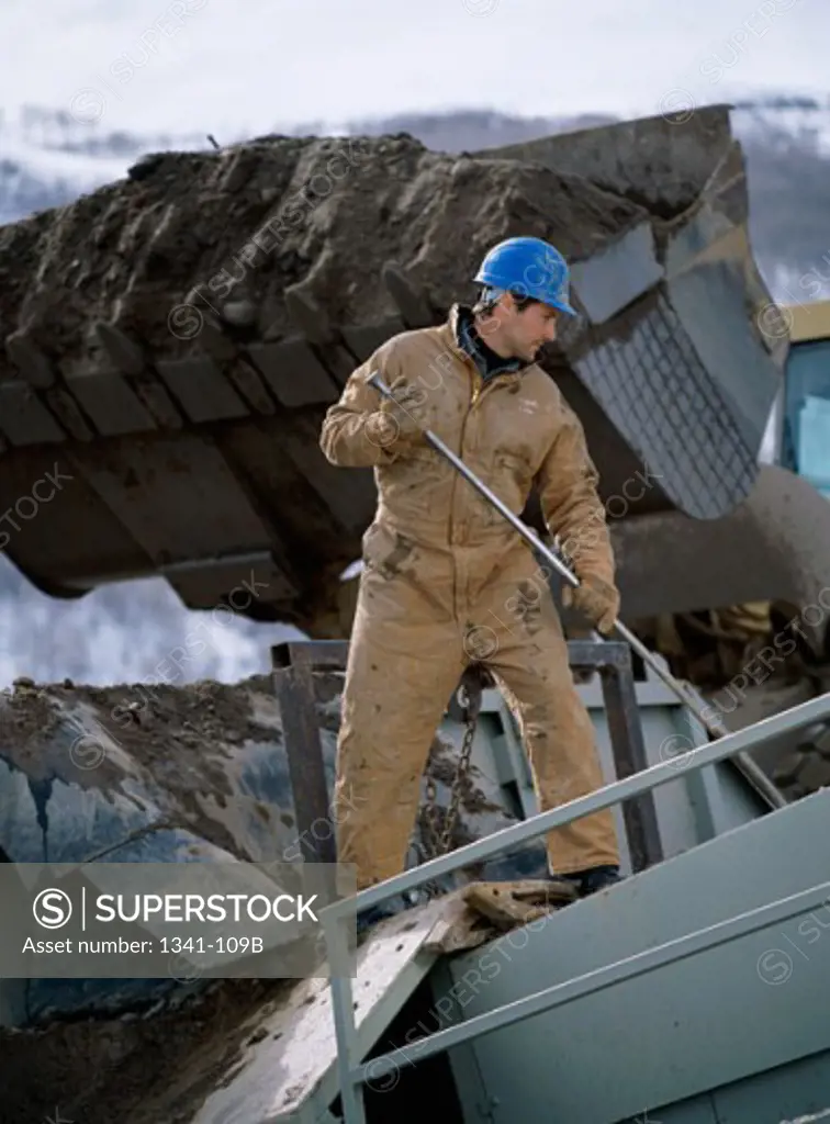 Worker at Rock Crushing Plant, Jackson, Wyoming, USA