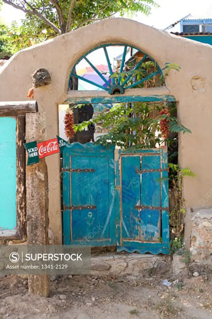 Rustic painted doors of a house, Chimayo, Rio Arriba County, New Mexico, USA