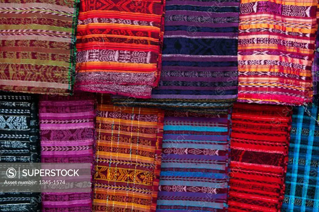 Colorful traditional fabric at a market stall, San Francisco El Alto, Guatemala
