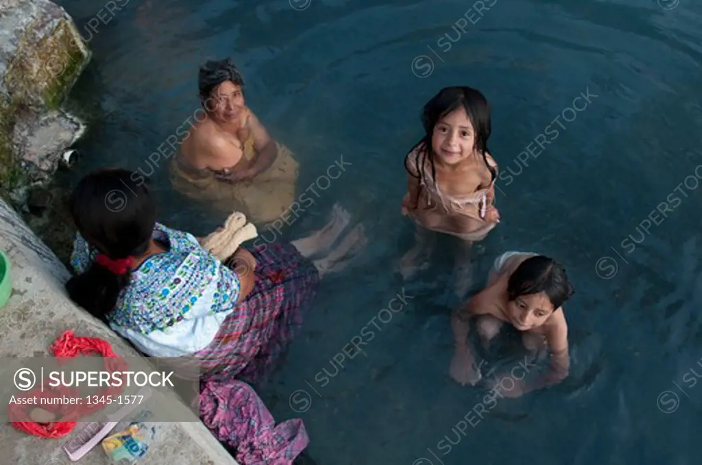 High angle view of people bathing in a pond, Totonicapan, Guatemala