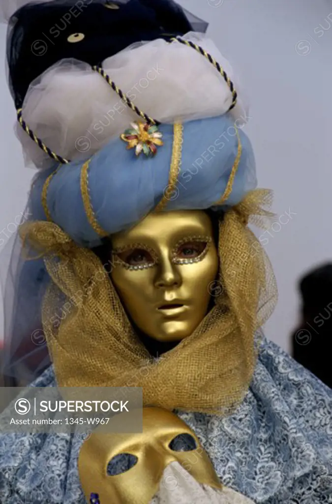 Portrait of a person wearing a masked carnival costume, Venice, Italy