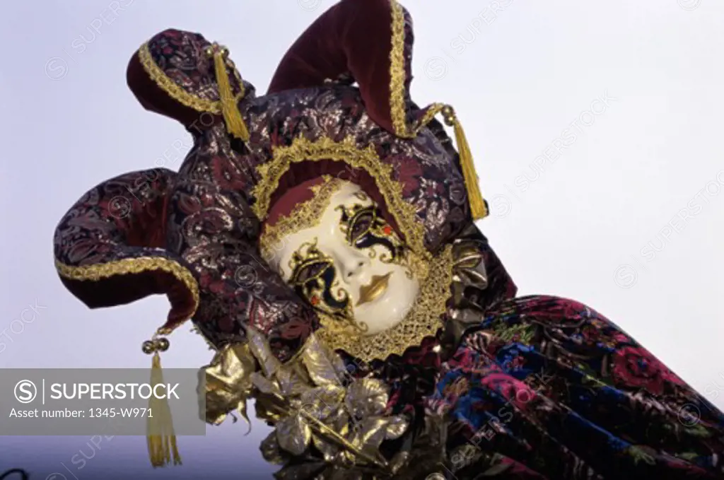 Close-up of a person wearing a masquerade mask, Venice, Italy