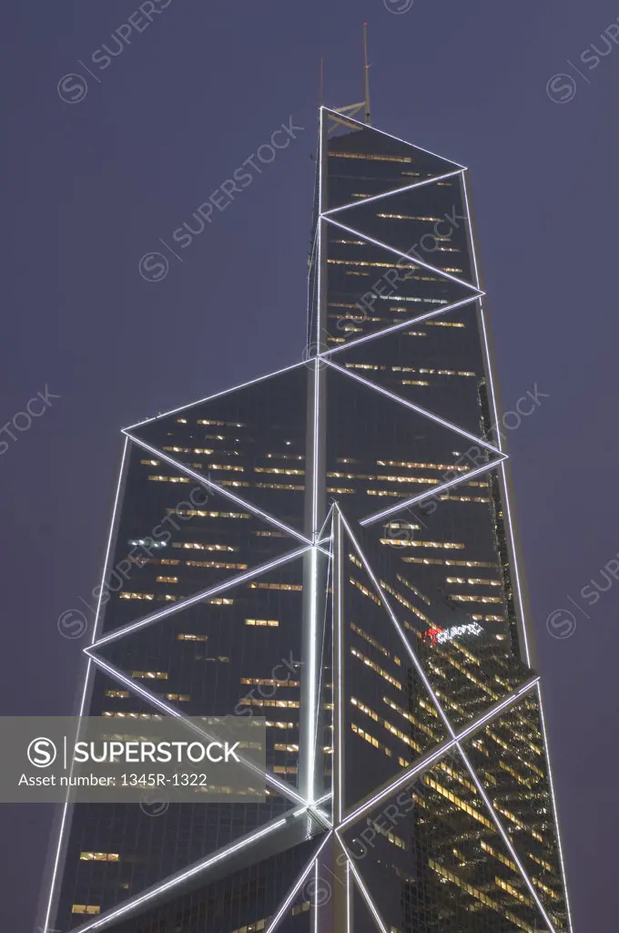 Low angle view of a bank building lit up at night, Bank of China Tower, Hong Kong, China