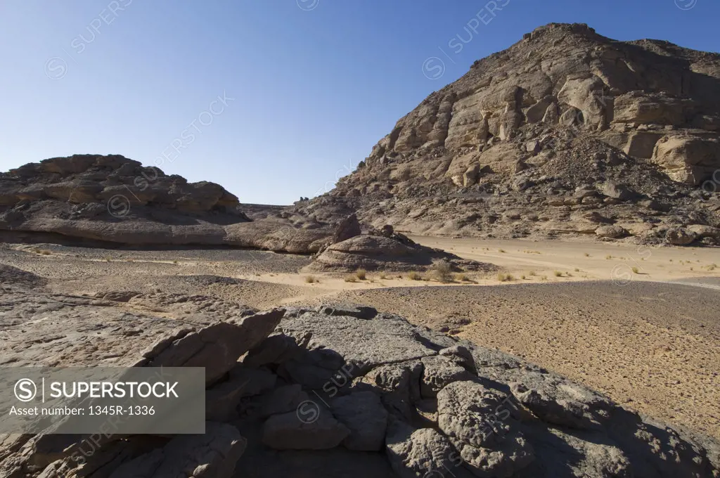 Rock formations in a desert, Tadrart Acacus, Fezzan, Libya