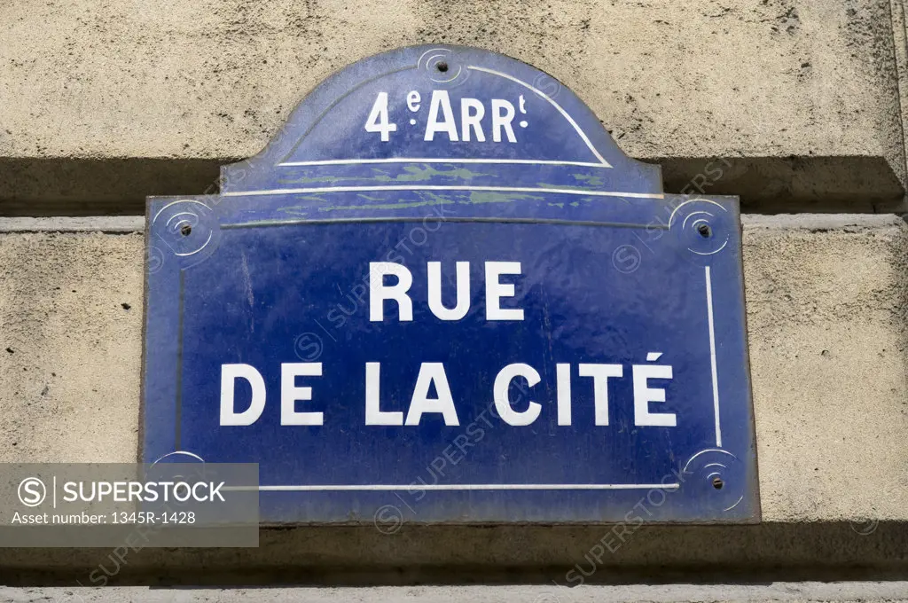 Close-up of a street name sign, Rue de la Cite, Paris, Ile-de-France, France