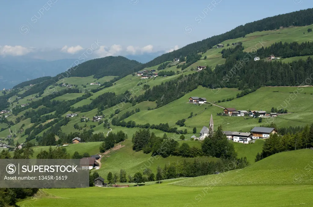 Houses on a landscape, Santa Maddalena, Funes Valley, Dolomites, Trentino-Alto-Adige, Italy
