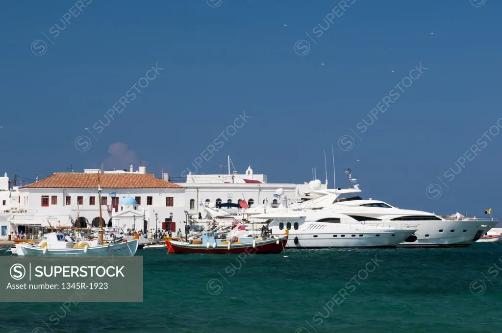 Boats docked at a harbor, Mykonos Town, Mykonos, Cyclades Islands, Greece