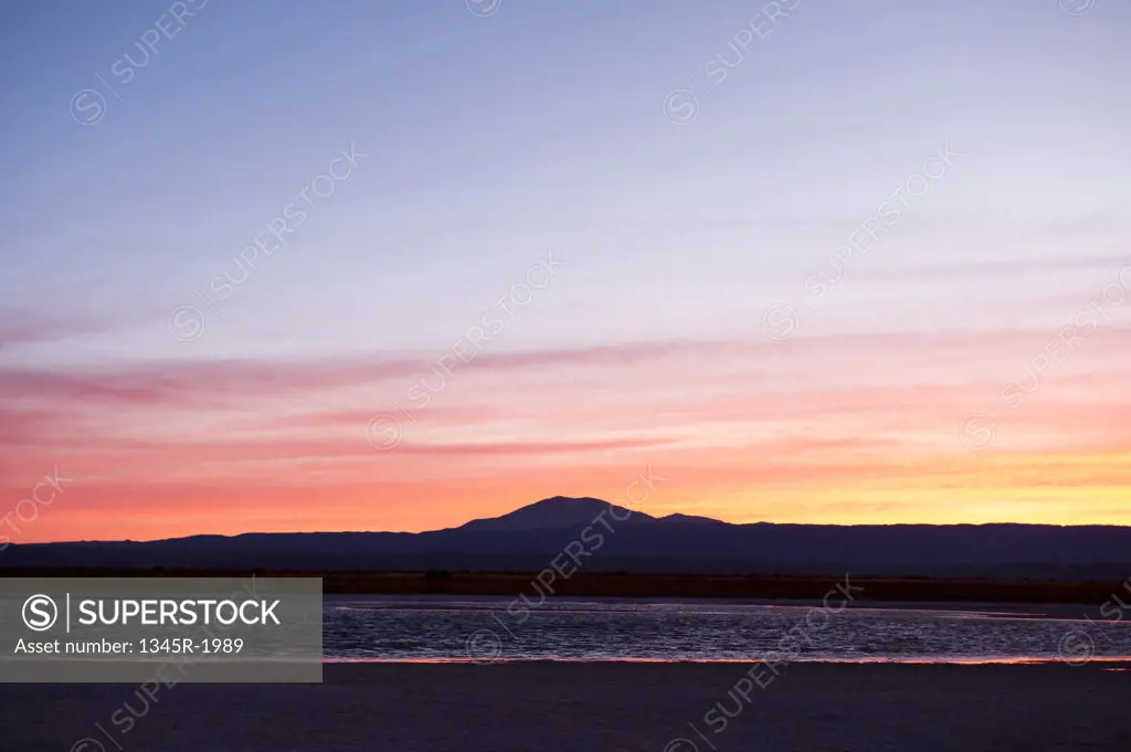 Chile, Atacama Desert, Salar de Atacama, Laguna Cejar at sunset