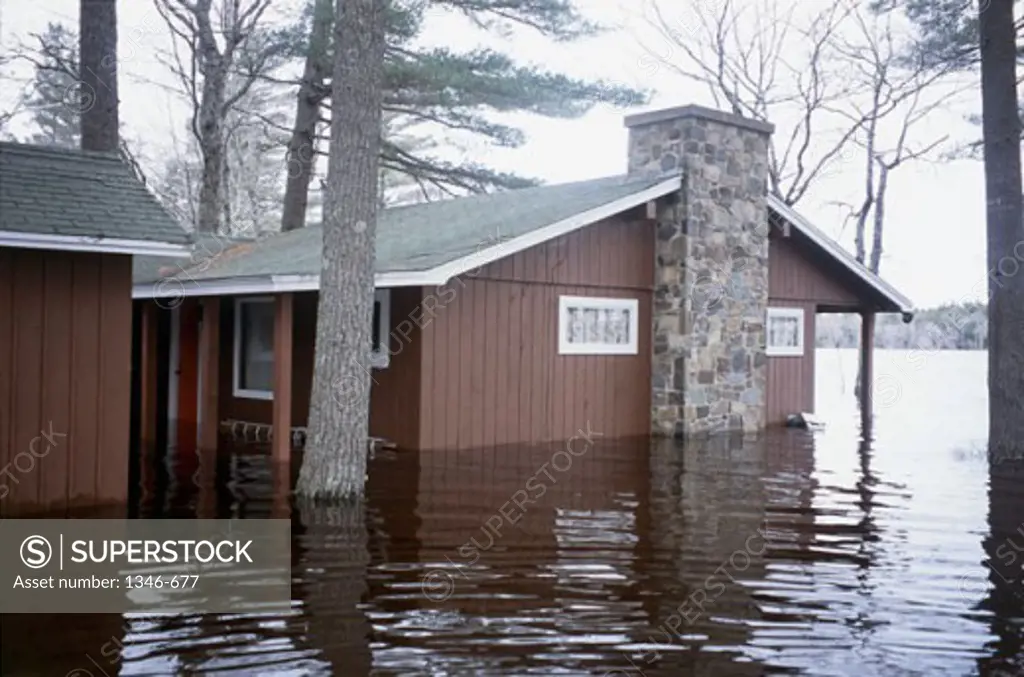 Houses partly submerged in flood water
