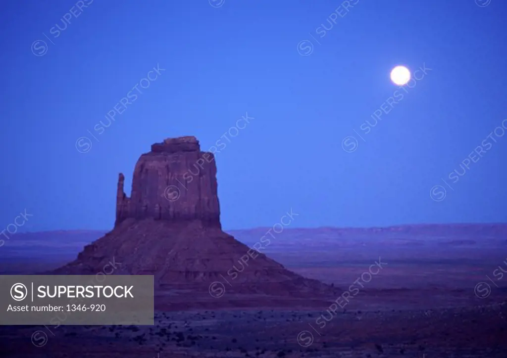 Rock formations on a landscape, The Mittens, Monument Valley Tribal Park, Arizona, USA