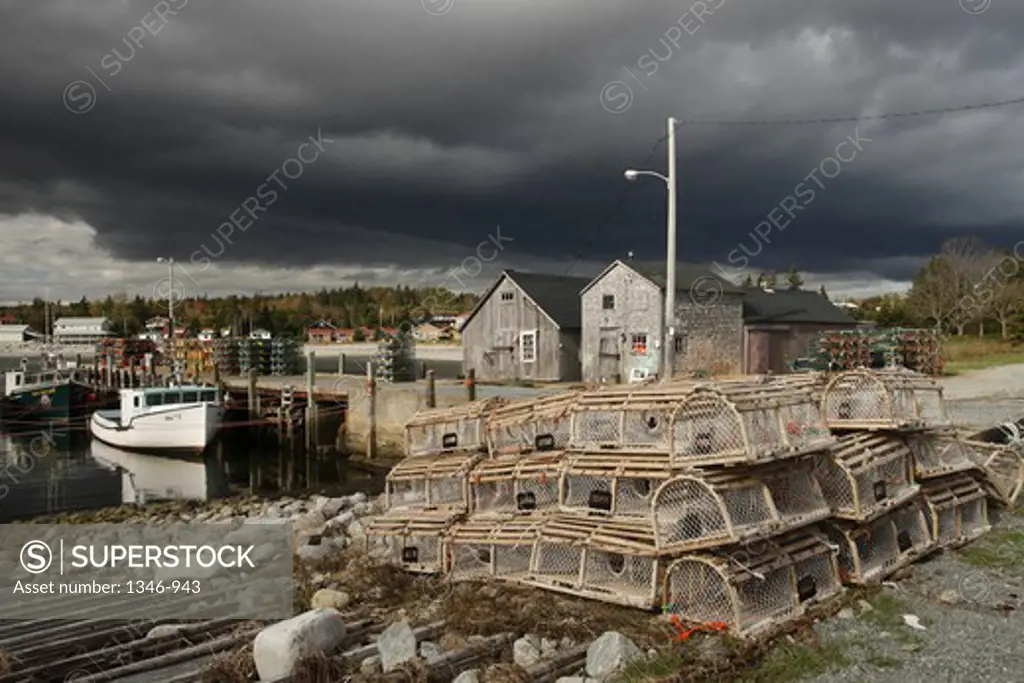 Stack of lobster traps at the riverbank