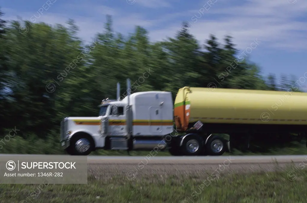 Side profile of a semi-truck on the road