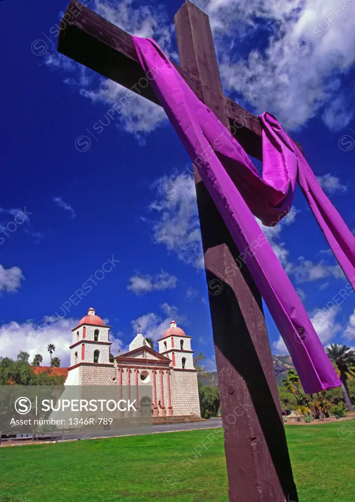 Low angle view of a cross in front of a church, Mission Santa Barbara, Santa Barbara, California, USA