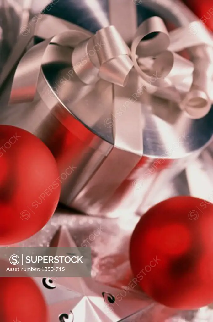 Close-up of Christmas ornaments with a Christmas present