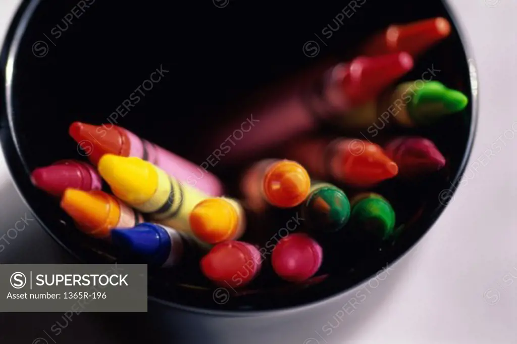 Close-up of crayons in a container