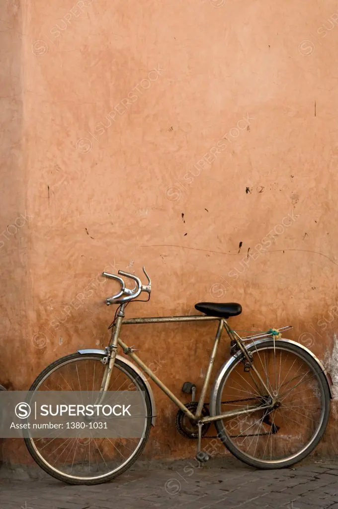 Bicycle parked against a wall, Medina, Marrakesh, Morocco