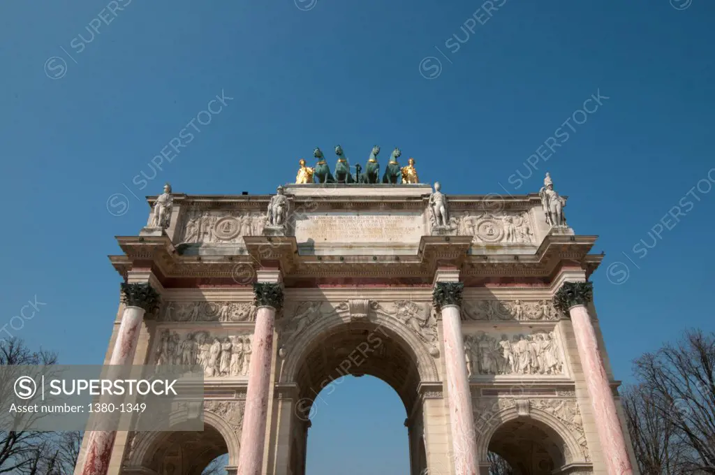 Low angle view of a triumphal arch, Arc De Triomphe Du Carrousel, Le Carrousel Du Louvre, Paris, Ile-de-France, France