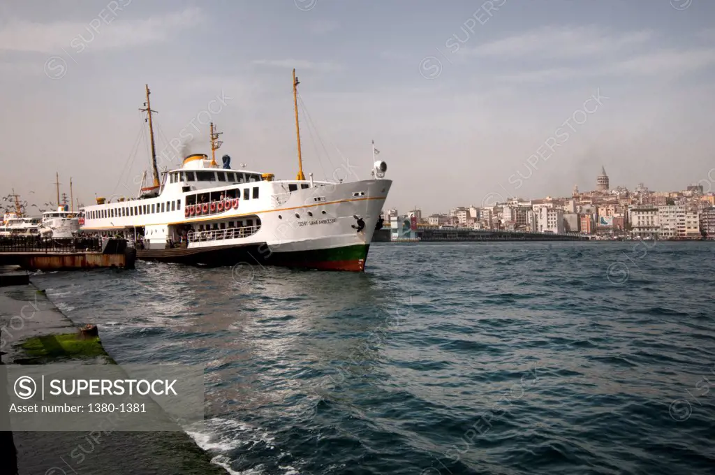 Ferry in the sea with city in the background, Istanbul, Turkey