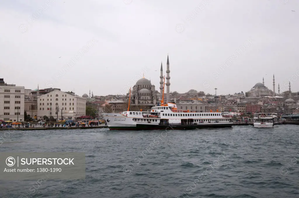 Boat in the sea with Blue Mosque and Hagia Sophia in the background, Istanbul, Turkey