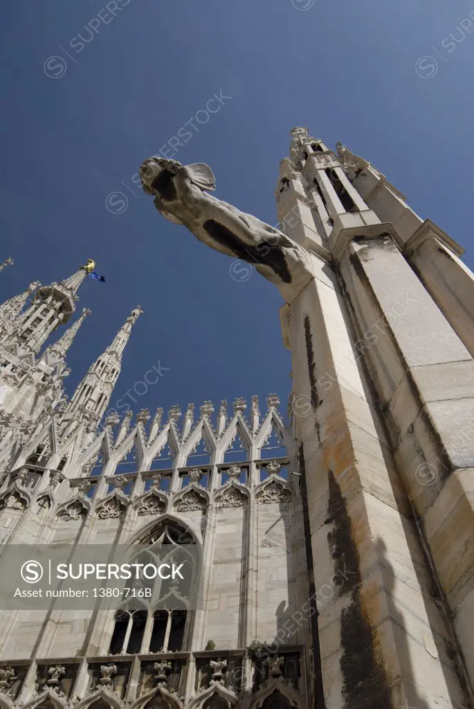 Low angle view of a church, Duomo, Milan, Lombardy, Italy
