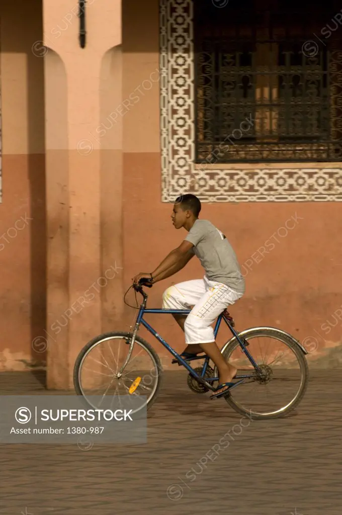 Man riding a bicycle, Marrakesh, Morocco