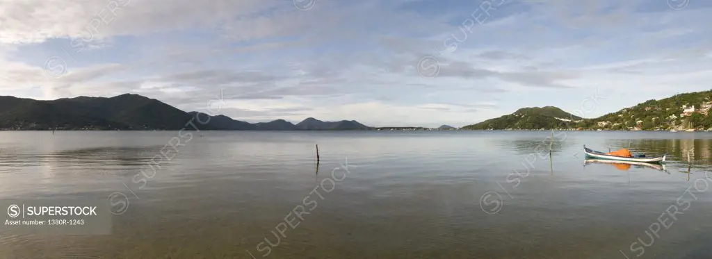 Lake with mountain range in the background, Florianopolis, Santa Catarina, Brazil