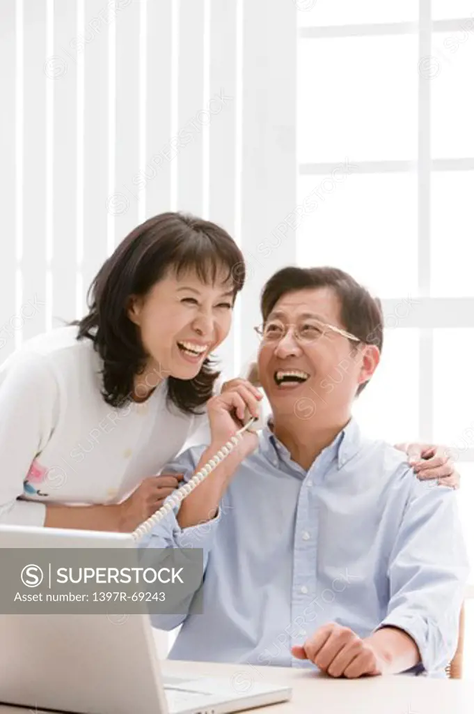 Couple, Couple laughing and on the phone