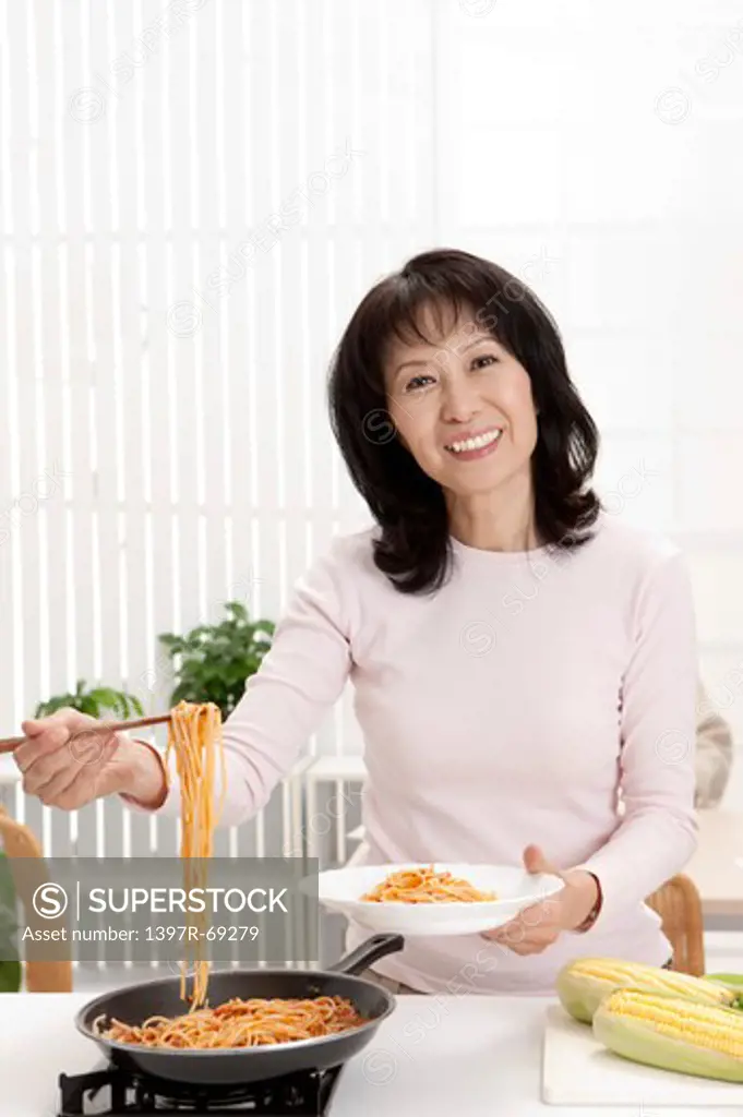 Couple, Woman holding a plate of noodles with smile