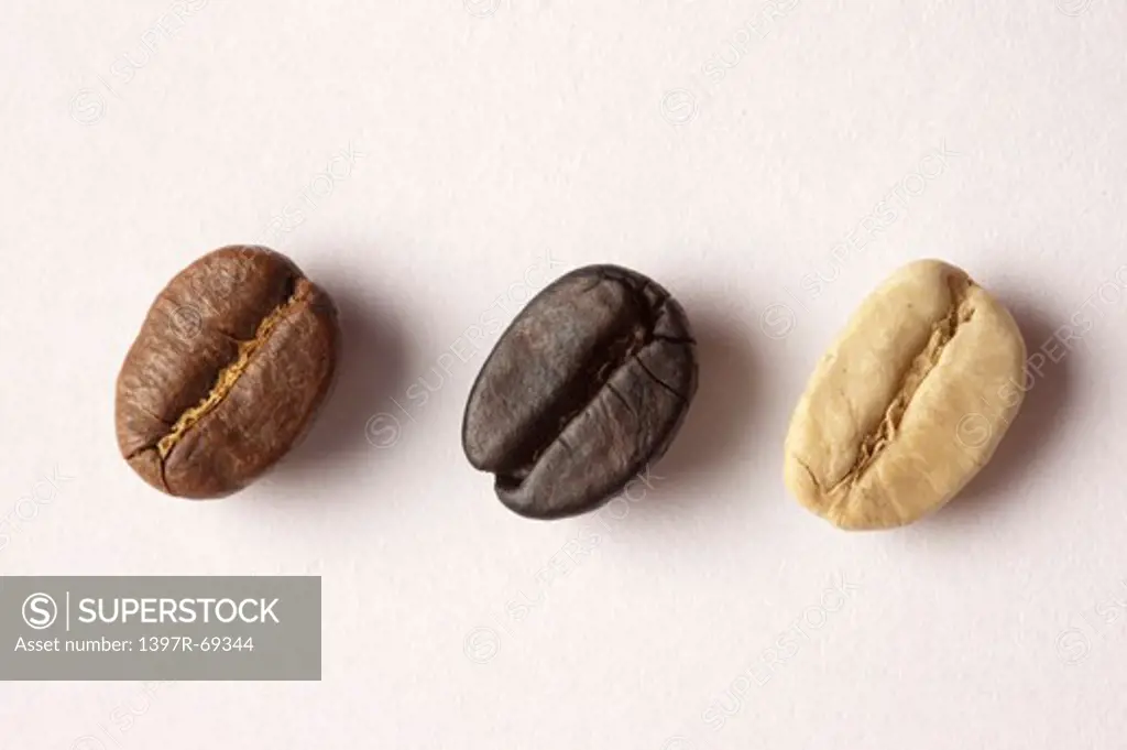 Coffee Bean, Close-up of three coffee beans with different colors