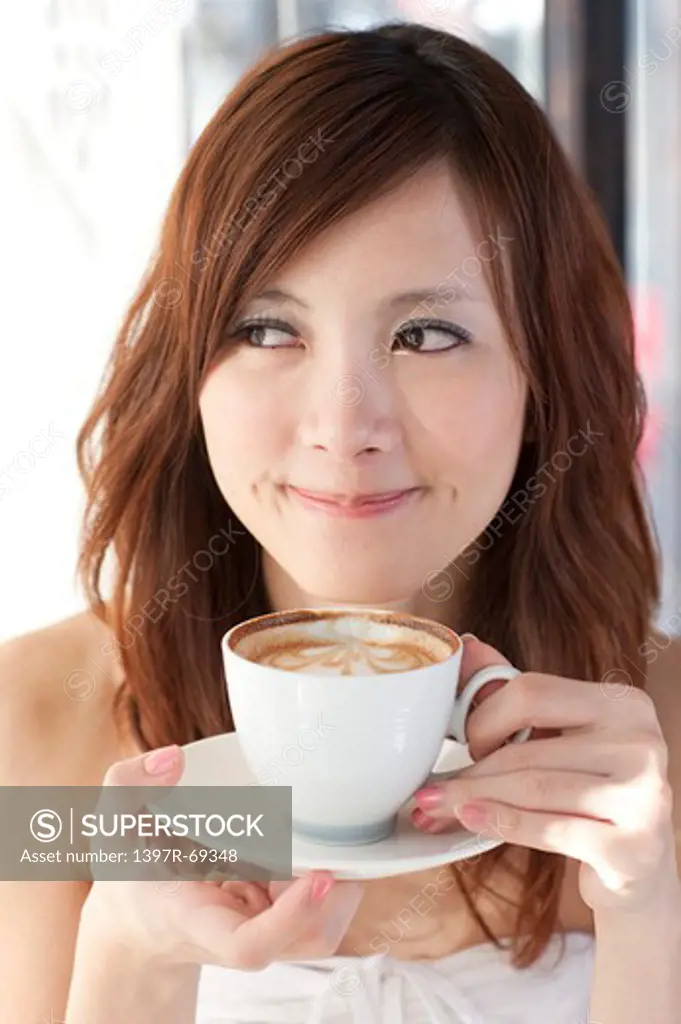 Leisure, Carefree, Relaxation, Coffee Break, Taste of Life, Young woman drinking a cup of cappuccino and looking away with smile
