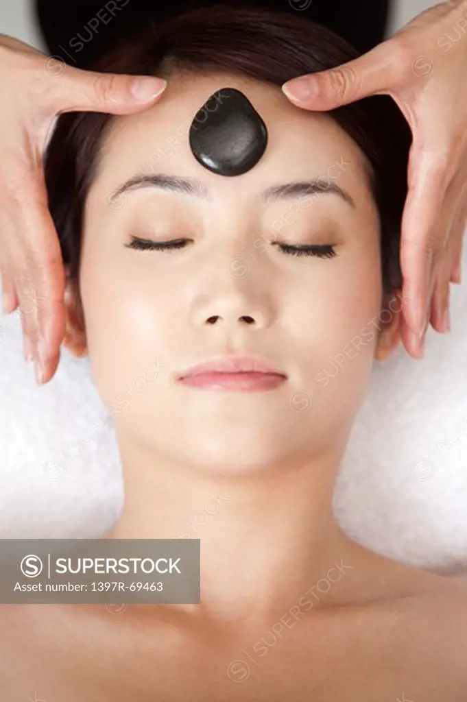 Beauty Treatment, Close-up of woman enjoying massaging with eyes closed