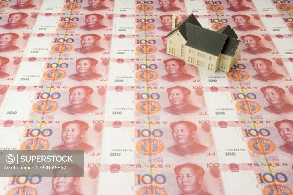 China Currency and a model house